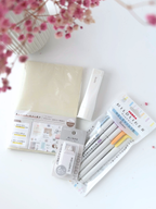 Journaling starter pack white aesthetic Japanese stationery weekly journal notebook pastel markers correction tape square glue stick